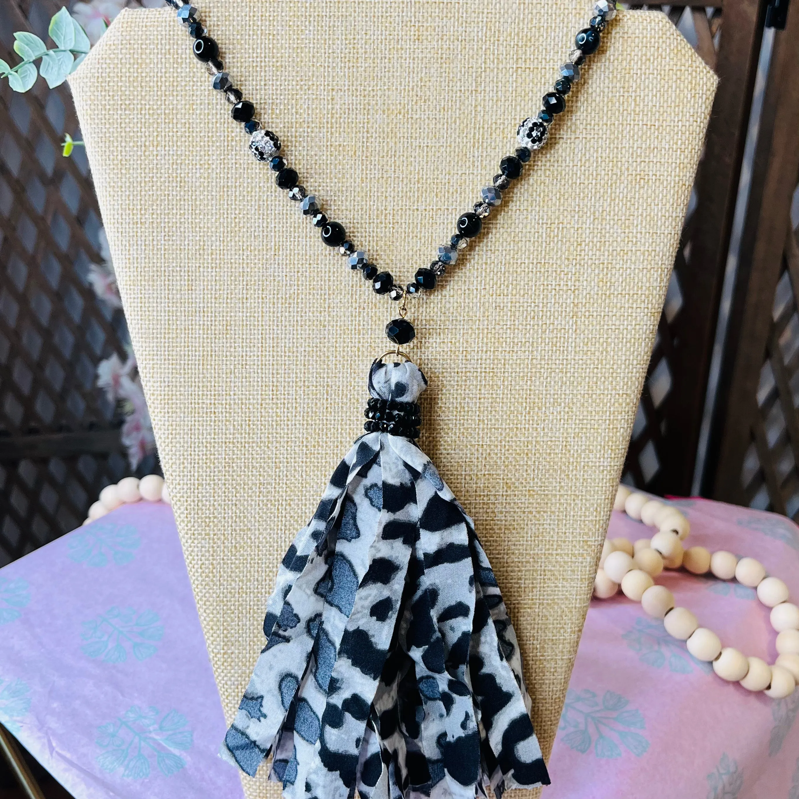 long beaded chain tassel necklace: black w/ leopard bead